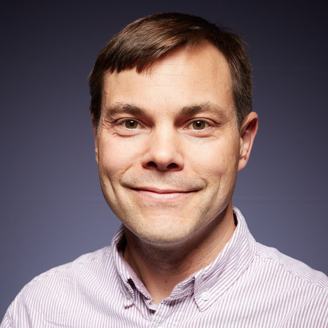 Dr Cédric John